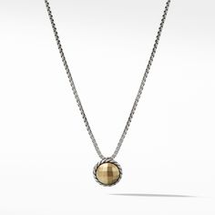 The Chatelaine(R) Collection is a perfect fusion of David and Sybil Yurman's combined art-the marriage of a sculptor and a painter-form and color. Sterling silver 18-karat bonded yellow gold dome Pendant, 8mm diameter Box chain, 1.25mm Adjustable length, 16-17" Lobster clasp Style Number: N11982 S8AGG17 Classic Yellow Gold Necklaces With Cabochon, Elegant Cabochon Jewelry For Ceremonial Occasions, Designer Yellow Gold Jewelry With Polished Finish, Designer Yellow Gold Necklace With Polished Finish, Designer Yellow Gold Polished Necklace, Designer Yellow Gold Necklaces With Polished Finish, Luxury Ceremonial Jewelry With Polished Finish, Ceremonial Luxury Jewelry With Polished Finish, Elegant Yellow Gold Necklace With Cabochon