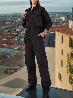 Utility chic is back in classic with this cargo-pocketed jumpsuit designed with a two-piece look and cut from rugged, lightweight ripstop. Size Chart（CM）: Techwear Cargo Pants With Flap Pockets For Workwear, Techwear Pants With Patch Pockets For Work, Utility Jumpsuits And Rompers For Workwear, Utility Cargo Pants With Functional Pockets For Work, Cargo Style Jumpsuits And Rompers For Workwear In Fall, Casual Workwear Jumpsuit With Flap Pockets, Utility Workwear Jumpsuits And Rompers With Multiple Pockets, Utility Jumpsuits And Rompers With Multiple Pockets For Work, Solid Jumpsuits And Rompers With Pockets For Work