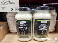 two jars of classic alfredo are on display for $ 9 99 each at costco