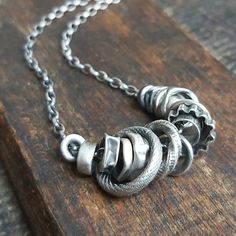 "Handmade oxidized textured sterling silver necklace with many elements - Valentine gift for your loved one It is available with either raw or polished finish. We offer necklaces in many sizes: 16\" (40 cm), 18\" (45 cm), 20\" (50 cm), 22\" (55 cm), 24\" (60 cm), 26\" (65 cm). Each necklace has an adjusttable - 2\" (5 cm). We send jewelry in an elegant box. Thanks for visiting Treendystudio!" Brutalist Metal Necklace With Oxidized Finish, Sterling Silver Pendant Chain Necklace With Oxidized Finish, Hand Forged Silver Metal Chain Necklace, Silver Brutalist Jewelry With Oxidized Finish, Everyday Sterling Silver Necklace With Oxidized Finish, Everyday Oxidized Metal Necklace, Silver Sterling Silver Brutalist Necklace, Brutalist Sterling Silver Necklace, Oxidized Silver Necklace