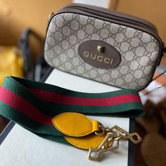 This Bag Was Never Worn And It’s In Great Condition. Designer Yellow Gucci Bag, Yellow Designer Gucci Bag, Gucci Pouch Shoulder Bag With Detachable Strap, Luxury Multicolor Bag With Adjustable Strap, Gucci Shoulder Bag With Adjustable Strap For Shopping, Gucci Leather Shoulder Bag With Logo Strap, Gucci Multicolor Bag For Everyday Use, Gucci Multicolor Shoulder Bag For Daily Use, Gucci Gold Shoulder Bag With Detachable Strap