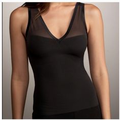 Spanx Haute Spanx 476 Alluring V-Neck Camisole Black From Spanx Haute Contour Line It’s Obvious Spanx Is Designed By Women For Women With This Spanx Alluring V-Neck Camisole. For Any V-Neck Dress, This Is The Perfect Tool To Slim And Support. The Reinforced Front Microfiber Panel Shapes And Supports The Stomach And Waist Area. Size - Xs Color - Black Style - 478 Condition - Brand New With Tag Nwt Inc-Shaper-Panties-1 Summer V-neck Shapewear With Built-in Bra, Fitted V-neck Shapewear For Summer, Fitted V-neck Top With Medium Bust Support, V-neck Shapewear With Built-in Bra, Elegant V-neck Stretch Shapewear, Bra-friendly Fitted V-neck Tank Top, Seamless V-neck Tank Top For Night Out, Seamless Fitted V-neck Shapewear, Elegant Black V-neck Camisole