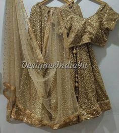 Indian wedding lehenga with embroidered blouse & dupatta for women. * Plus size available at a small up-charge. * Size: This is custom made outfit as per your size. Post your order we will send you a measurements reference sheet using which you can provide details required to make your outfit with best fit. * Fabric and work: Lehenga - Antique gold sequine fabric with very good quality lining and lace border. Blouse - Sequins fabric. Dupatta - Dupatta is in gold net with embroidery lace border o Gold Party Dress With Resham Embroidery, Gold Saree Dress With Mirror Work, Gold Lehenga With Mirror Work For Reception, Semi-stitched Gold Embroidered Sharara For Party, Semi-stitched Sharara With Gold Embroidery For Party, Party Semi-stitched Sharara With Gold Embroidery, Gold Embroidered Sharara For Party, Designer Semi-stitched Choli With Gold Embroidery, Party Wear Gold Anarkali Set With Resham Embroidery