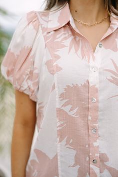 This blouse is so cute! We love the muted coloring of that tropical floral print. The cut of this blouse also makes it great for work or weekends. Who doesn't love versatility! Collared neckline Button down front closure Short bubble sleeves Tropical floral print No stretch Savannah is wearing the small. Collared Hibiscus Print Top For Spring, Collared Tops With Hibiscus Print For Spring, Vacation Floral Print Button-up Blouse, Hibiscus Print Button-up Top For Vacation, Vacation Hibiscus Print Button-up Top, Tropical Hibiscus Print Button-up Top, Short Sleeve Leaf Print Spring Top, Tropical Floral Print Button-up Top, Tropical Style Button-up Top With Floral Print