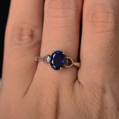 This is a gorgeous handmade creation. Its beauty is its simplicity & Elegance. The 6*8mm oval shape faceted lab sapphire is crafted in solid sterling silver and with rhodium plated. All item is sent in a beautiful gift box If you have any idea of design your ring,pls contact me directly. You can realize more lovely stuff clicking the link https://www.etsy.com/shop/knightjewelry?refshopsection_shophome_leftnav Please leave the correct address and you phone number for delivering successfully. Oval Sapphire Promise Ring, Oval Cubic Zirconia Sapphire Ring Gift, Oval Sapphire Solitaire Birthstone Ring, Oval Sapphire Solitaire Promise Ring, Oval Birthstone Jewelry With Lab-created Sapphire, Oval Lab-created Sapphire Birthstone Jewelry, Oval Lab-created Sapphire Ring, Blue Oval Birthstone Ring In Sterling Silver, Oval Sapphire Birthstone Ring