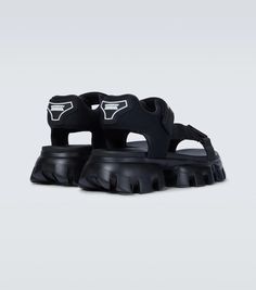 These tank sandals from Prada are made in Italy with woven fabric straps, featuring VELCRO® fastenings, chunky rubber soles, and a rubberized logo at the heel counter..Closure: VELCRO®-fastening ankle strap.Lining: fabric.Made in Italy.Sole: fabric insole, rubber sole.Toe shape: round open toe.Upper: fabric.True to size.Half sizes please take the next size up.UK sizes.6,0cm-2.5' heel (size EU 42) Prada Cloudbust Thunder, Cloudbust Thunder, Prada Cloudbust, Prada Shoes, Mens Sandals, Personal Shopping, Lining Fabric, Shoe Collection, Woven Fabric