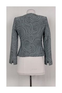 Upscale Armani Collezioni jacket with a unique dark grey stitched rose pattern. Great for evening wear, this unique jacket can be worn with a silk tank top and fitted pencil skirt. You will exude sophistication. Size 2 Made in Italy Dark grey stitching w/ rose pattern Button down front Lined Padded shoulders Bust 32" Waist 28" Shoulder to hem 20" Unique Jackets, Textured Jacket, Silk Tank Top, Armani Collezioni, Silk Tank, Rose Pattern, Evening Wear, Dark Grey, Pencil Skirt