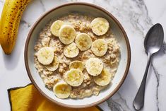 a bowl of oatmeal with bananas on top