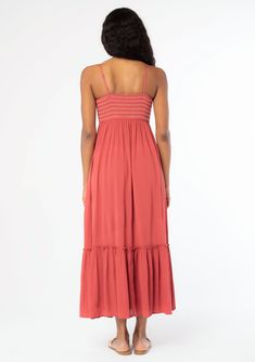 A timeless bohemian maxi dress you'll be reaching for all season. Designed in a flowy crinkle gauze, this effortless dress features a slim-fit smocked bodice with contrast thread detail, adjustable spaghetti straps, and must-have side pockets. Crinkle gauze Slim fit smocked bust Flowy skirt Sleeveless Maxi length Ruffle-trimmed tiered skirt Straight neckline Contrast thread detail Button front Adjustable spaghetti straps Side pockets Flowy bohemian maxi dress Model is 5'9, wearing a size S.Style Flowy Maxi Dress With Smocked Bodice, Brunch Maxi Dress With Smocked Back And Flowy Skirt, Flowy Maxi Dress With Smocked Back, Maxi Dress With Smocked Back And Flowy Skirt, Bohemian Dress With Smocked Back And Flowy Skirt, Smocked Bodice Rayon Maxi Dress, Bohemian Rayon Maxi Dress With Smocked Bodice, Flowy Midi Dress With Elastic Waistband For Vacation, Bohemian Maxi Dress With Smocked Bodice And Flowy Skirt