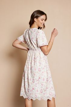 Beautiful rose and ivory eyelet midi dress with scalloped hem. keyhole back closure and elastic back band. Self and Lining 100% Polyester Hand wash in cold water. Aprox. measurements in inches: coming soon S:Length-41 |Bust-34 |Waist-28 M:Length-42 |Bust-36 |Waist-29 L:Length-43 |Bust-38 |Waist-32 XL:Length-44 |Bust-42 |Waist-34 modest dresses, modest dress, modest midi, modest maxi, modest fashion, modest trendy dresses, modest boutique, modest attire, modest clothing, modest tops, modest skirt Spring Day Dresses With Scalloped Edges, Spring Daywear Dresses With Scalloped Edges, Spring Midi Dress With Scalloped Edges, Modest Summer Dresses With Lace Trim, Modest Lace Trim Summer Dress, Modest Midi Dress With Smocked Back For Garden Party, Modest Midi Dress With Lace Trim, Modest Mid-length Dress With Smocked Back, Feminine Dresses With Scalloped Edges For Garden Party