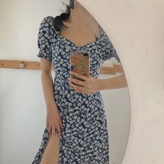 Experience the joy of summer with our Floral Bloom Split Midi Dress. This breezy and flowy dress features a beautiful floral pattern and a flattering split design, perfect for any warm weather occasion. Elevate your style and embrace the summer vibes with tthis midi dress. ☀️🌼 Size Chart: Size Bust (cm) Shoulder (cm) Sleeve (cm) Length (cm) Bust (in) Shoulder (in) Sleeve (in) Length (in) S 88 35 27 105 34.65 13.78 10.63 41.34 M 92 36 28 106 36.22 14.17 11.02 41.73 L 96 37 29 107 37.80 14.57 11. Summer Midi Maxi Dress With Floral Print, Trendy Floral Print Midi Dress For Vacation, Trendy Ditsy Floral Print Summer Dress, Trendy Knee-length Sundress For The Beach, Trendy Knee-length Beach Sundress, Floral Print Midi Dress For Summer, Floral Print Maxi Sundress For Day Out, Trendy Floral Print Sundress For Brunch, Trendy Floral Print Sundress For The Beach