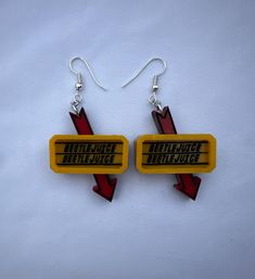 Beetlejuice sign dangle earrings made from lightweight, durable acrylic material.    *Do not get earrings wet or leave in sun* If you have any questions or concern just let me know!! Thank you so much for supporting my shop(: Beetlejuice Jewelry, Beetlejuice Earrings, Beetlejuice Sign, Crazy Earrings, Baking Items, Funky Earrings, Funky Jewelry, Beetlejuice, Acrylic Earrings