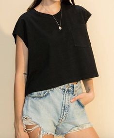 Oversized cropped muscle tee, crew neck with pocket in black. -100% Cotton Black Boxy Cropped T-shirt With Crew Neck, Black Loose Fit Cropped Cotton T-shirt, Black Boxy Cropped Cotton T-shirt, Black Boxy Cropped Top, Black Cropped T-shirt With Crew Neck, Black Crew Neck Cropped T-shirt, Black Boxy Fit Cropped T-shirt, Black Boxy Cropped T-shirt, Black Relaxed Fit Cropped Shirt With Short Sleeves