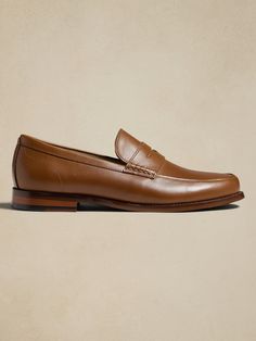 Leather Penny Loafer | Banana Republic Factory Classic Wingtip Dress Shoes, Elegant Business Moccasins With Goodyear Welt Construction, Classic Almond Toe Dress Shoes With Goodyear Welt, Classic Tassel Loafers With Brogue Detailing, Slip-on, Classic Tassel Loafers With Brogue Detailing, Classic Loafers With Leather Sole For Formal Occasions, Classic Leather Sole Loafers For Formal Wear, Classic Brown Tassel Loafers For Formal Occasions, Classic Formal Loafers With Leather Sole