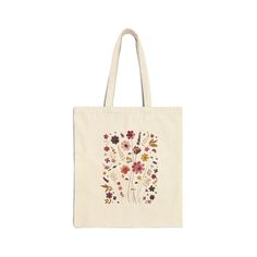 This 100% cotton bag comes in one size - 15" x 16"- perfect for everyday wear. While the canvas material will show off your designs in great colors, it's durable and will last for years. The bag features 20" handles (made from the same canvas), making it easy to carry even with a week's worth of shopping. .: 100% cotton canvas .: Heavy fabric (12 oz/yd² (406.9 g/m .: Sewn-in label .: Available in natural and black colors Natural Cotton Canvas Shoulder Bag, Cotton Tote Shoulder Bag, Cotton Canvas Bag With Gusset For Everyday Use, Cotton Canvas Tote Bag For Daily Use, Cotton Tote Canvas Bag For Daily Use, Daily Use Cotton Tote Canvas Bag, Natural Cotton Shoulder Bag For Daily Use, Canvas Tote Gift Bag, Natural Cotton Rectangular Bag