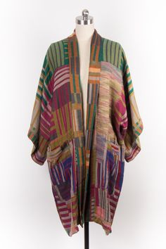 With this Woven Long Cotton Kimono Jacket, you can set the tone for the season! The clothing's 100 percent cotton structure ensures maximum comfort and durability! The two front pockets make it easy to stow knickknacks when out and about. It also goes well with the tried-and-true classics and basics that indeed make up the majority of your wardrobe. Material: 100% Cotton Made In India Multicolor Cotton Outerwear For Layering, Bohemian Outerwear For Fall With Relaxed Fit, One Size Cotton Outerwear For Fall, Multicolor Relaxed Fit Outerwear With Pockets, One Size Long Sleeve Cotton Outerwear, Relaxed Fit Multicolor Outerwear With Pockets, Colorful Casual Outerwear For Spring, Multicolor Cotton Outerwear For Fall, One Size Cotton Outerwear For Layering