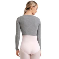 the back view of a woman's bodysuit with long sleeves and high waist