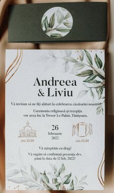 an elegant wedding card with leaves on it