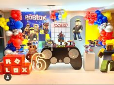 a video game themed birthday party with balloons