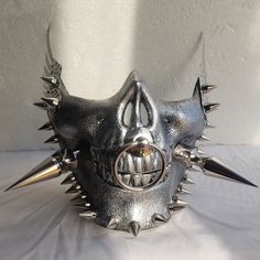 This mask is made to order and handcrafted, so it will take me about 2~3 working days to make and dispatch.For more information on shipping take a look at my 'About' section on my shop page or my FAQ. Thank you and if you have any other questions please don't hesitate to contact me. Spiky Mask, Cyberpunk Masks And Prosthetics For Halloween Cosplay, Punk Full Face Mask For Cosplay, Full Face Punk Masks And Prosthetics For Cosplay, Punk Style Full Face Masks And Prosthetics For Cosplay, Post-apocalyptic Halloween Masks And Prosthetics, Handmade Masquerade Mask For Halloween Cosplay, Cyberpunk Halloween Costume Accessories, Gothic Masks For Costume And Cosplay Events