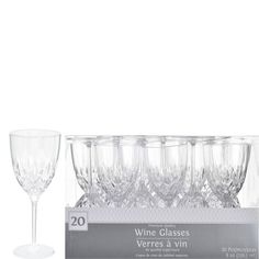 the wine glasses are lined up next to each other