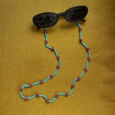 Level up your style with this boho beaded sunnies chain! Whether you are running errands, at the beach, in carpool, or traveling, this glasses chain is a safe (and trendy) way to keep your glasses secure and nearby. Imagine knowing your glasses are not getting scratched in your bag or having your hands free when you take off your shades... sounds nice right?! Beaded Sunnies, Daisy Glasses, Beaded Daisy, Mask Chain, Sunglass Chain, Glasses Chain, Daisy Chain, Flower Child, You Bag