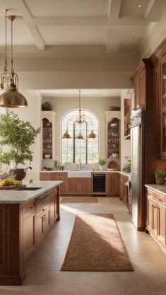 a large kitchen with lots of wooden cabinets and counter space, along with an area rug on the floor