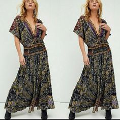 Forever Femme In A Floral Print, This Timeless Maxi Dress Is Featured In A Deep V-Neck, Absolutely Stunning Detail For All Occasions. - Dropped Waist Silhouette - Flutter Dolman Sleeves - Mirror-Embellished Detail Throughout For Added Dimension - Back Tie Detail - Front Tie Closure - Pleating On Skirt For Stylish Shape Care/Import Hand Wash Cold Import Contents Lining: 100% Modal 100% Modal 100% Poly Sleeve Len.: Approx 12" Bust: 40" Len: 58" Nwot/Boutique Size: 2 Retail: $298.00 **Was Unable To Bohemian Fitted V-neck Maxi Dress, Black Boho Print V-neck Dress, Black V-neck Boho Dress For Festival, Black Boho Print Maxi Length Dress, Black Bohemian V-neck Dress, Black V-neck Boho Dress With Print, Black V-neck Boho Dress With Boho Print, Black Floral Maxi Dress For Festivals, Black V-neck Maxi Dress With Boho Print