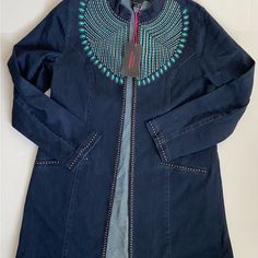 This Stunning Beaded Denim Jacket From Midnight Velvet! Featuring Intricate Beadwork That Adds A Touch Of Elegance To Classic Denim, This Long Jacket In A Rich Blue Is Perfect For Any Occasion. Crafted From High-Quality Fabric, It Offers A Flattering Fit While Providing Comfort And Durability. Brand New With Tags. Details: Brand: Midnight Velvet Color: Blue Size: Medium Features: Beaded Detailing, Long Jacket Style Condition: New With Tags (Nwt) Material: Denim Beaded Blue Denim Jacket For Spring, Spring Blue Beaded Denim Jacket, Spring Beaded Denim Outerwear, Spring Beaded Blue Denim Jacket, Spring Blue Beaded Outerwear, Casual Long Sleeve Beaded Outerwear, Fall Blue Beaded Outerwear, Long Jacket Style, Denim Long Jacket