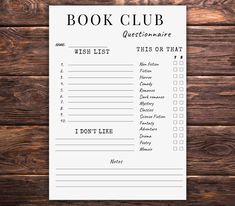 a book club checklist on top of a wooden table