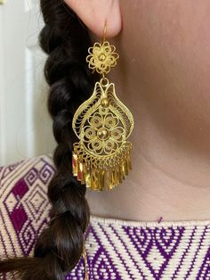 Beautiful Artisanal Mexican Traditional Earrings - Gold Plated Folkloric Earrings made by our Oaxaca Artisan Partners.  These earrings are typically worn for Traditional Folkloric Dances. They are the perfect accessory for a Fiesta themed party. These earrings are very lightweight.  Care * cloth wipe to clean * delicate care * wipe to dry Please email me your questions before buying. All of my items come from a smoke and pet free environment. I WILL BE PROCESS YOUR ORDER IN 1-2 DAYS. If you need Mexican Culture Accessories, Mexican Earrings Gold, Eloquii Earrings, Artisan Teardrop Pierced Earrings, Traditional Filigree Chandelier Earrings, Artisan Filigree Drop Earrings, Traditional Teardrop Pierced Earrings, Artisan Dangle Plug Earrings, Traditional Handmade Flower Earrings As Gift