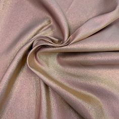 a close up view of a pink fabric