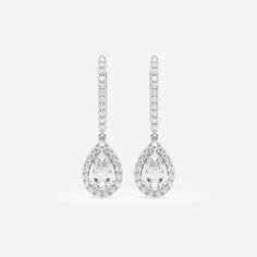 Pair your pears with these majestic drop shaped lab grown diamond dangles. Encircled with star-like round diamonds these gorgeous pear shaped diamonds are true stunners. Luxury Diamond White Pear-shaped Chandelier Earrings, Luxury White Gold Pear-shaped Earrings, Luxury Pear-shaped Hoop Earrings For Women, Lab Grown Diamond Earrings, White Brilliant Cut Pear Teardrop Earrings, White Brilliant Cut Teardrop Earrings, White Pear Teardrop Earrings With Brilliant Cut, White Pear-shaped Teardrop Earrings With Brilliant Cut, White Diamond Pear Teardrop Earrings