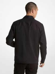 This jacket is designed to make any outfit look sharp, whether you wear it with jeans or tailored pants. The shirt-inspired style is crafted from stretch cotton in a minimalist profile that fastens with a sleek zip closure. A pair of patch pockets come in handy for keeping small items within reach. Wear it with a T-shirt or collared shirt depending on the occasion. Modern Tops With Concealed Placket For Workwear, Modern Tops With Concealed Placket, Modern Workwear Tops With Concealed Placket, Modern Tops For Workwear With Concealed Placket, Modern Long Sleeve Tops With Concealed Placket, Modern Long Sleeve Top With Concealed Placket, Tailored Business Tops With Concealed Placket, Tailored Top With Concealed Placket For Workwear, Modern Fold Down Collar Tops For Work