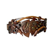 This vintage brown steampunk leather bracelet with a metal dragonfly can be a perfect jewelry gift for men or women. The bracelet is totally handcrafted and carved by hand. That's why it is really a unique piece of art. Each cuff in my shop is made of genuine leather and decorated with metal parts. Bracelet's width is about 2.2 in (5.5 cm) Bracelet's length is about 7.9 in (20 cm) It is adjustable and fits the wrist 6.7-7.9 in (17-20 cm) Please measure your wrist to make the correct choice  IMPORTANT - since it's a handmade item there might be slight variations in the design, however, the general idea and impression will be preserved. CARE No special care is required. Avoid chemical exposure including perfumery. If you need a custom order please let me know and I will try to do my best to Leather Dragonfly, Skull Collar, Metal Dragonfly, Steampunk Bracelet, Steampunk Leather, Steampunk Jewelry, Personalized Bracelets, Vintage Brown, Leather Fashion