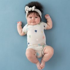 Our bamboo bodysuits are an essential piece for every mini wardrobe. Silky smooth and perfectly stretchy, these bodysuits work as both a standalone outfit or coordinating piece with any other Kyte Baby product. 97% Rayon made from Bamboo, 3% Spandex Breathable material Designed for sensitive skin Snap closures Mini Wardrobe, Womens Matching Sets, Kyte Baby, Holiday Wishlist, Mom Care, Adult Blanket, Boho Moon, Bag Hanger, Toddler Blanket