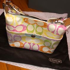 Brand New Never Used Coach Hand Bag Nwot Coach Multicolor Rectangular Bag, Multicolor Rectangular Coach Bags, Yellow Coach Satchel Shoulder Bag, Coach Yellow Satchel Shoulder Bag, Yellow Shoulder Bag For On-the-go, Yellow Coach Shoulder Bag With Double Handle, Coach Yellow Double Handle Bag, Yellow Coach Shoulder Bag, Coach Yellow Double Handle Shoulder Bag