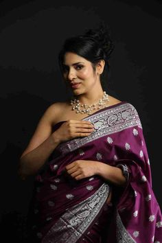 Look like a fashion goddess in this Wine purple Silk saree! Perfect for any occasion, it features silver motifs and brocade for a touch of elegance. Soft and comfortable, it will elevate your style to the next level. Elegant Brocade Pre-draped Saree For Designer Wear, Elegant Pre-draped Saree With Motifs For Festivals, Traditional Silver Pre-draped Saree With Pallu, Silver Semi-stitched Pre-draped Saree For Designer Wear, Semi-stitched Silver Pre-draped Saree, Silver Bollywood Pre-draped Saree For Festive Occasions, Festive Silver Bollywood Pre-draped Saree, Designer Silver Blouse Piece With Traditional Drape, Silver Blouse Piece With Traditional Drape For Designer Wear