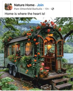 a mobile home is decorated with flowers and greenery