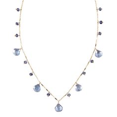 A stunning piece of everyday elegance, the Briolette Drop Necklace is another bestseller. The decadent drops of stationary gemstones look great with a casual outfit but can easily transition to a formal occasion. Handcrafted in 14k gold-fill or sterling silver Available in 18" or 32" length with a lobster claw clasp Shown in green amethyst, garnet, blue topaz, white topaz. Also available with precious stones. View our Gem Glossary Briolette Necklace, Gold Drop Necklace, Everyday Elegance, Pink Topaz, Green Amethyst, Drop Necklace, Precious Gemstones, White Topaz, Lobster Claw