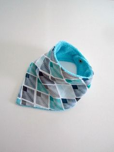 "This PDF Sewing Tutorial with Pattern guides you step-by-step with photo and written instructions in making your own Bandana Style Baby Bib with a Snap Dome Closure. Size: 6 months - 36 months Neck Circumference: 28cm / 11\" Chin to Chest: 16cm / 6.3\" *Please note: Not strictly following the 1/4\" seam allowance where mentioned will reduce the neck circumference in size* *YOU ARE NOT PURCHASING A FINISHED BIB* This PDF, Instant Download File Includes:  - Full Size Pattern Piece (Simply Print, Cut and Sew)  - Fabric and Materials List  - Step-by-Step Photo Instructions  - Step-by-Step Written Instructions  - Language: UK English *Other closure options can be used e.g. velcro or sew on domes etc however, it is recommended you stay true to the placement directions given within the tutorial Toddler Bibs Pattern, Baby Gifts To Sew, Gifts To Sew, Etsy Tutorial, Toddler Patterns, Pouch Sewing, Bandana Style, Toddler Bibs, Bib Pattern