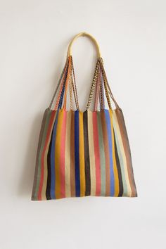 These versatile totes are handwoven by artisans in Chiapas, Mexico on a backstrap loom. Perfect for a beach day, the farmer's market, or as an everyday purse! This bag is approx. 16" wide x 26" tall with the strap. Due to the handmade nature, height and width of bag can vary up to 10%. Affordable Handwoven Summer Bags, Affordable Handmade Multicolor Canvas Bag, Cheap Multicolor Cotton Bags, Cheap Multicolor Bags For Market, Onam Fashion, Hammock Bag, Fashion Show Themes, Mexican Bag, Backstrap Loom