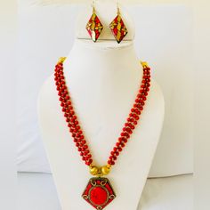 A Beautifully Designed Tibetan Jewellery, Brings An Art Of Elegance. The Perfectness And Attractiveness Of Its Adds To Rare Beauty, Making Ideal For All Ages Spiritual Dangle Jewelry For Festivals, Unique Latkans Necklaces As Gift, Unique Latkans Necklace As Gift, Traditional Decorative Necklaces For Gifts, Traditional Decorative Necklace For Gifts, Handmade Jewelry For Gifts And Festivals, Multicolor Jewelry With Unique Variations For Festivals, Red Necklaces With Latkans For Celebration, Festive Jewelry Sets With Round Beads For Gifts