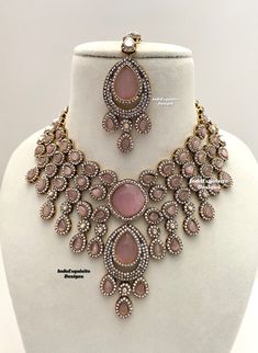 Elegant Bollywood style Victorian Monalisa stones necklace comes with statement Earrings and Tikka/ Indian Jewelry/Premium Quality Polki and Kundan Jewelry/Pink   All items are shipped from Brampton, Ontario, Canada. If you need your item by a certain day, please reach out to us for express delivery option before placing the order so that we can update the shipping for you. Standard shipping/delivery timeline Below are the delivery timeline estimates. We dispatch all orders by the next business Pink Hand Set Bridal Earrings For Wedding, Pink Hand-set Bridal Earrings For Wedding, Elegant Pink Bridal Set With Stone Work, Pink Stone Work Bridal Earrings For Wedding, Pink Stone Work Jewelry Sets For Wedding, Pink Stone Work Jewelry For Wedding, Elegant Pink Chandbali Bridal Necklace, Pink Hand Set Necklace For Wedding, Pink Hand Set Bridal Necklace For Party