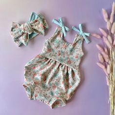 Get ready for some fun in the sun with this bubble romper, made of stretchy cotton lycra fabric. Perfect for hot summer days, it has cute shoulder tie straps and a snap closure bubble bottom. Plus, it makes a great baby shower gift with its perfect blend of style and comfort. Don't forget to top off the look with an oversized bow headband! 🧺Care: Cold machine wash Line dry As each piece is unique, print position may vary slightly.  Shipping within Australia is a flat rate of $10 with a tracking Spring Fitted Bubble Romper For Playdate, Fitted Bubble Romper For Spring Playdate, Fitted Bubble Romper For Playdate In Spring, Cute Printed Summer Jumpsuits And Rompers, Blue Summer Bubble Romper For The Beach, Playful Bubble Romper For Beach In Spring, Pink Printed Onesie For Summer, Fun Cotton Onesie For Summer, Fitted Bubble Romper For Summer Playdate