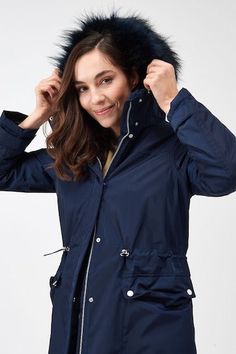 Women's Hooded Puffer Parka Coat In Blue The women's hooded puffer parka coat in blue offers a perfect blend of warmth and sophistication for winter. Made from durable 100% polyester with a soft viscose lining, this parka is designed to keep you cozy while looking stylish. Featuring a hooded collar, zip closure with button overlay, and open hem cuffs, it provides optimal comfort against the cold. With two inside and two side pockets for added practicality, this blue parka is an essential outerwear piece for chilly days. Outer Shell: 100% Polyester Inner Shell: Viscose Lining Feature: Parka Coat With Hood Closure Style: Zipper With Buttons Collar Style: Hooded Cuffs Style: Open Hem Inside Pockets: Two Outside Pockets: Two Side Pockets Color: Blue Blue Weatherproof Hooded Jacket For Fall, Blue Windproof Hooded Jacket For Winter, Blue Weatherproof Parka For Winter, Fitted Outerwear With Detachable Hood, Blue Hooded Windproof Outerwear, Blue Windproof Parka For Fall, Blue Windproof Hooded Outerwear, Blue Weatherproof Hooded Jacket For Cold Weather, Blue Hooded Outerwear With Double-lined Hood