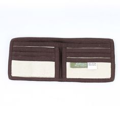 "Your wallet is your smallest accessory, but it can have the greatest vibes. This wallet is made of cotton canvas, making it durable and flexible. It has a full-length pocket perfect for bills and checks, and has smaller pockets that snugly fit your ID and cards. The Mushroom print is printed in an ombre style. Pair with a boho bag for a complete look of good vibes. Details: 100% Cotton 4\" high X 9\" wide (open) 4\" high x 4 1/2\" wide (folded) Made in Nepal" Casual Bifold Wallet For Everyday Use, Casual Everyday Wallets With Pockets, Casual Bifold Travel Wallets, Casual Rectangular Wallet With Coin Pocket, Casual Wallets With Interior Card Slots For Everyday Use, Casual Wallets With Card Slots, Casual Everyday Wallets With Interior Card Slots, Casual Everyday Wallet With Interior Card Slots, Casual Beige Wallets For Daily Use