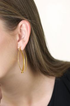 UNIQUE / LIGHTWEIGHT / HYPOALLERGENICThe abstract marquise shape of these earrings makes a statement without being too loud. They are modern, minimal and lightweight to be worn all day at office or an evening out. Handmade with extreme care and precision with the finest 925 sterling silver base and a thick layer of hypoallergenic 18k gold vermeil.Length 6 cm* Send me a dm if you need them in silverM A T E R I A L S 925 sterling silver, 18k hypoallergenic gold vermeil ( we use a very thick layer Gold Hoop Threader Earrings For Gift, Single Hoop Threader Earring As Gift, Minimalist Small Hoop Earrings For Gift, Handmade Minimalist Threader Earrings As Gift, Modern Round Wrap Earrings As Gift, Modern Round Wrap Earrings For Gift, Minimalist Brass Plug Earrings As A Gift, Modern Adjustable Wrap Earrings As Gift, Modern Handmade Wrap Earrings For Gift