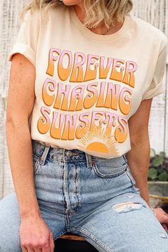 Forever Chasing Sunsets Summer Graphic T Shirts.Unisex Crew Neck Short Sleeve Tees.Crafted from premium materials, tailored to your lifestyle, ensuring a comfortable fit for any occasion.Family Group Uniforms Birthday Party Gift Concert Festival Events.High Quality Direct To Film Printed Graphic Design.100%COTTON,HEATHER(52%COTTON,48%POLY),ATH.HEATHER,BLACK HEATHER(90%COTTON,10%POLY)NICARAGUAMade In: Nicaragua Casual Summer T-shirt With Lettering, Retro Slogan Tops For Spring, Summer Everyday Tops With Letter Print, Summer Tops With Letter Print For Everyday, Summer Letter Print Tops For Everyday, Summer Short Sleeve T-shirt With Lettering, Spring Short Sleeve T-shirt With Lettering, Trendy Summer T-shirt With Lettering, Casual Summer Tops With Lettering