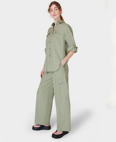 Our new utility-style everyday trousers. Made from a light and breathable linen blend with a touch of stretch. Relaxed, wide leg silhouette with shirred waistband. Two side slip pockets and two pockets on the leg. Pair with the matching shirt. Inseam length: 77cm / 30". Model wears size S and is 178cm/5'10" tall.. Style Code: SB9585Colour: Savannah Green Spring Wide Leg Pants With Patch Pockets For Work, Spring Workwear Pants With Flap Pockets, Summer Relaxed Fit Pants With Flap Pockets, Utility Linen Cargo Pants With Relaxed Fit, Spring Utility Cargo Pants For Workwear, Spring Cargo Pants With Side Pockets And Straight Hem, Utility Cargo Pants For Spring Workwear, Versatile Wide Leg Pants With Pockets For Spring, Spring Utility Wide Leg Work Pants